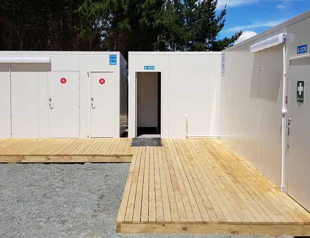 Exterior view of a portable shower and toilet unit in New Zealand
